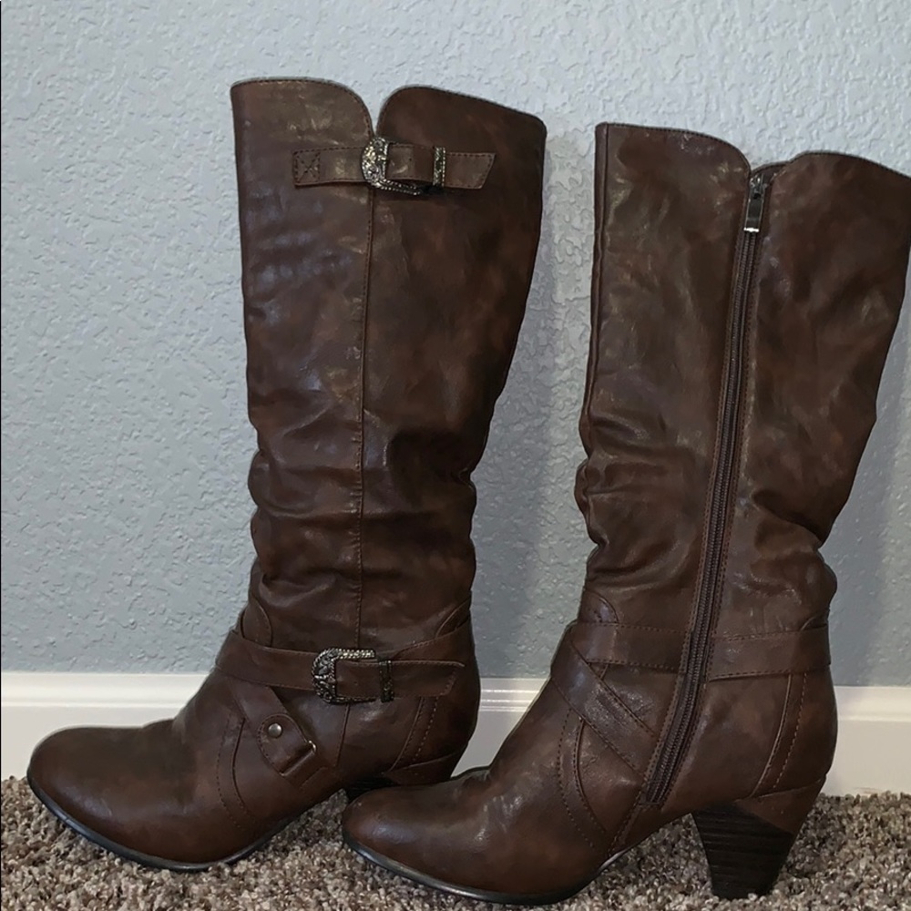 Brown boots, below the knee